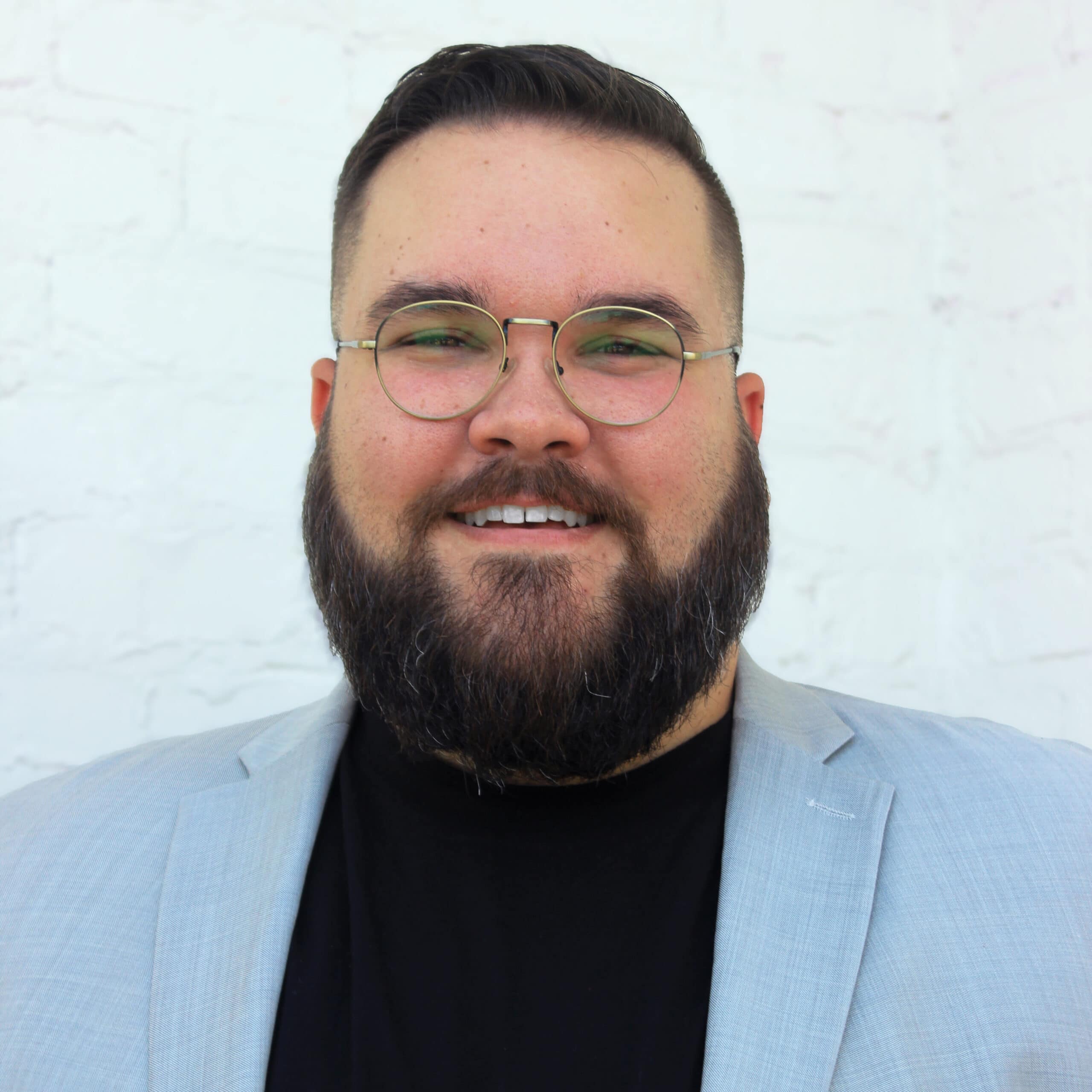 CAleb Headshot Cropped 2 1 scaled 1 - - Leading Edge Manufacturing